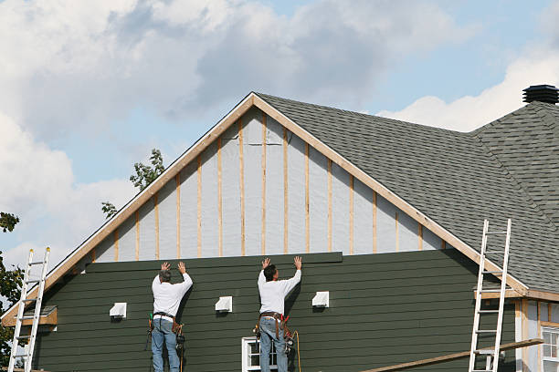 Professional Storm Damage Siding Repair technician working in La Grange Park, IL